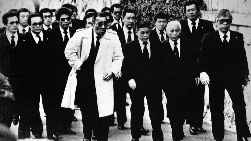 Japan: A group of Yakuza gangsters sporting business suits and emanating menace, possibly members of the Tokyo-Yokohama based Inagawa-Kai, c. 1960